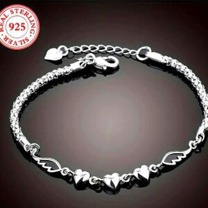 Ladies Elegant 925 sterling silver charm bracelet.
